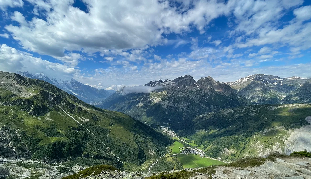 Dramatic view between high alpine peaks on a heli-hiking safari in the Alps