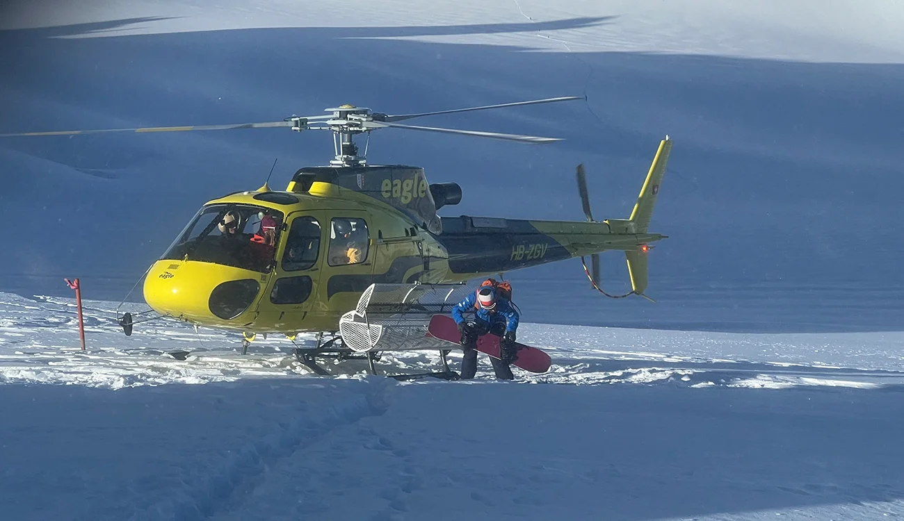 heli-ski-safari-helicopter-alps Helicopter used for heli skiing access to remote Alpine summits on a SwisSkiSafari trip
