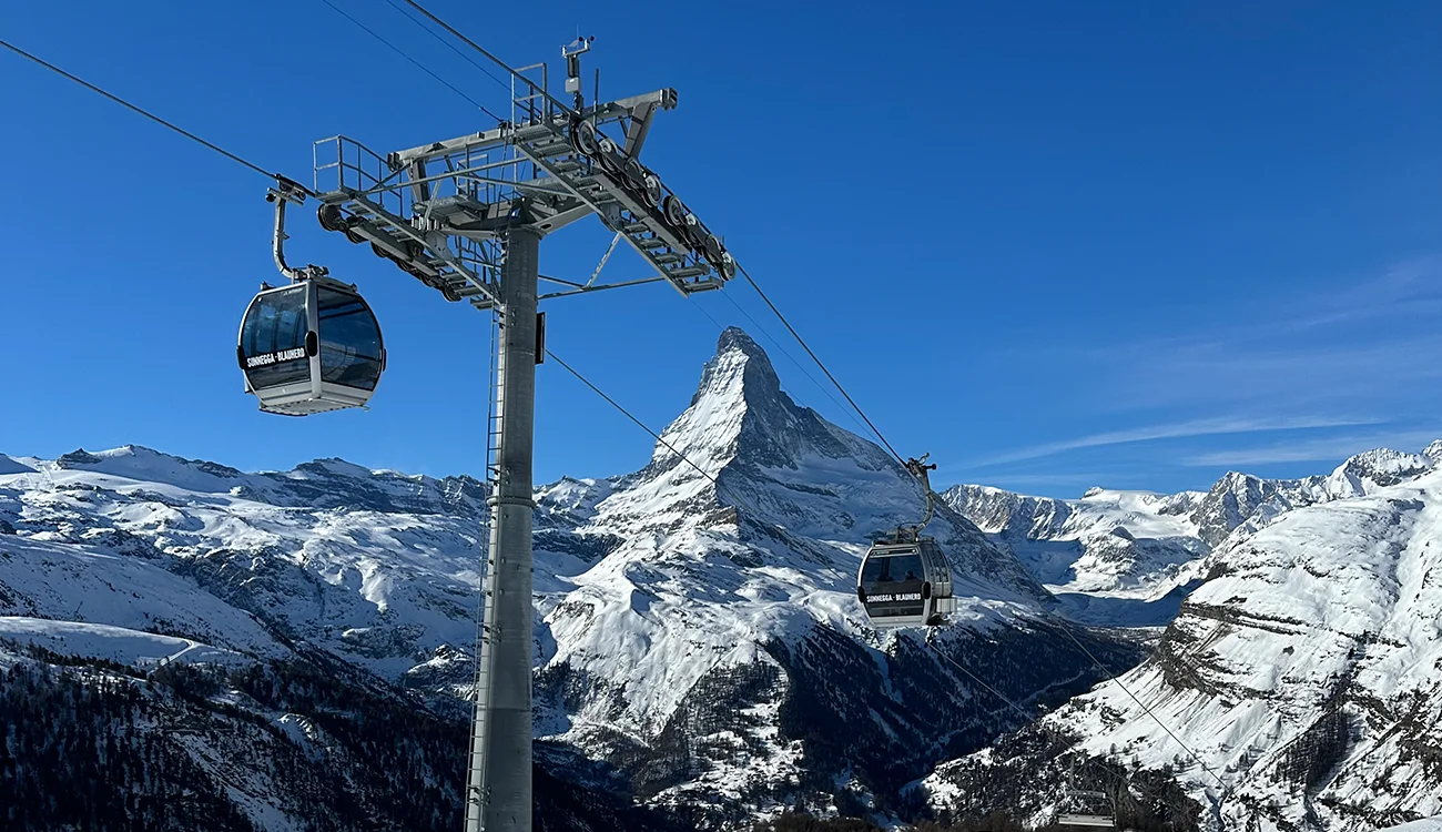 ski-lift-with-the-matterhorn-in-the-background Ski lift with the Matterhorn visible in the background in the Alps