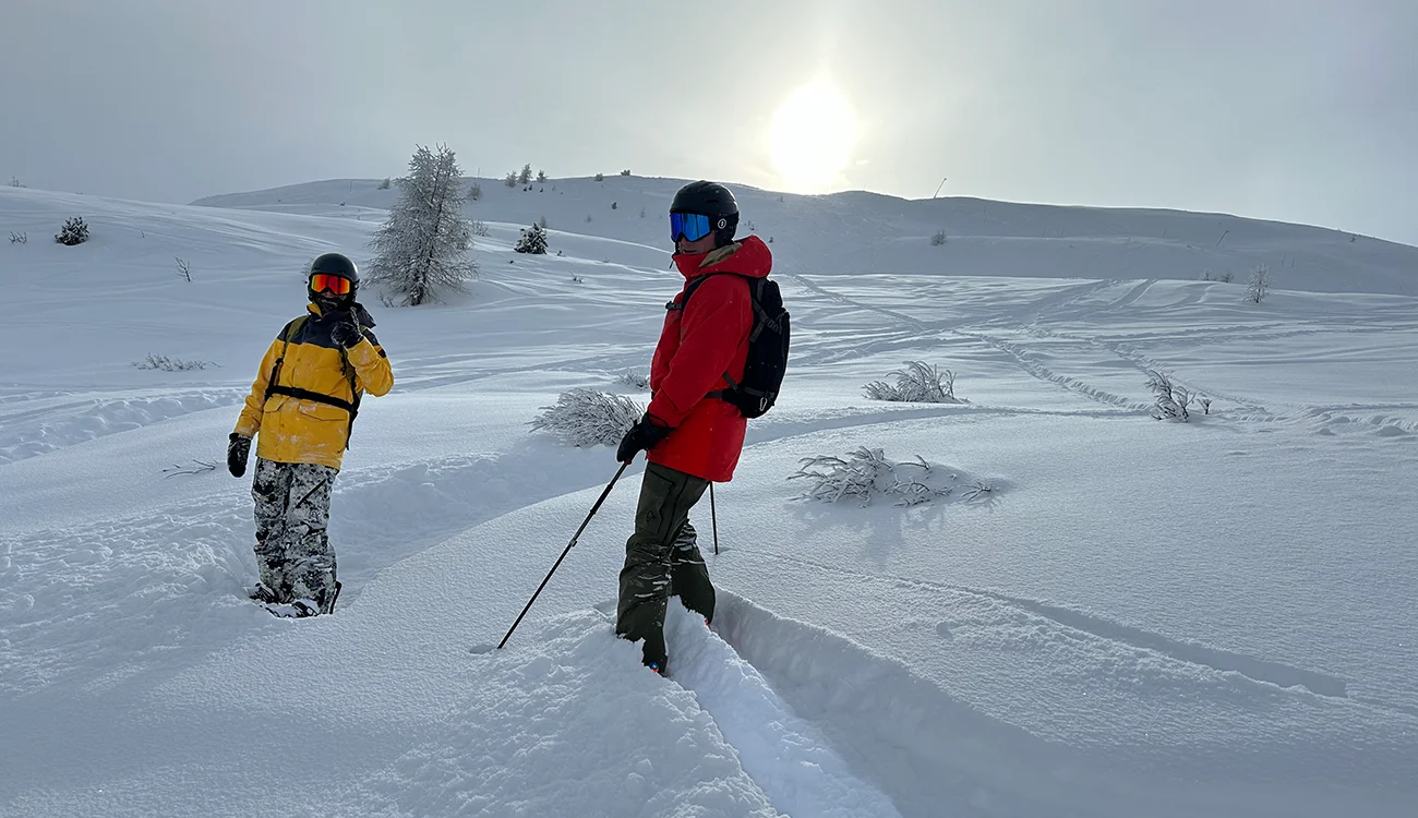 skier-and-snowboarder-in-powder-snow-zermatt-march