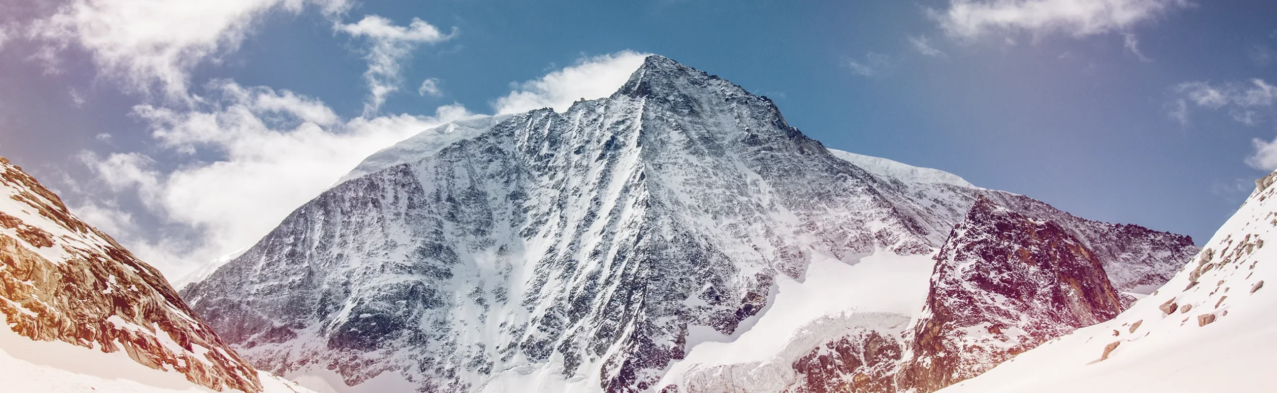 spectacular-alpine-mountain-panorama Panoramic view of a spectacular mountain in the Alps